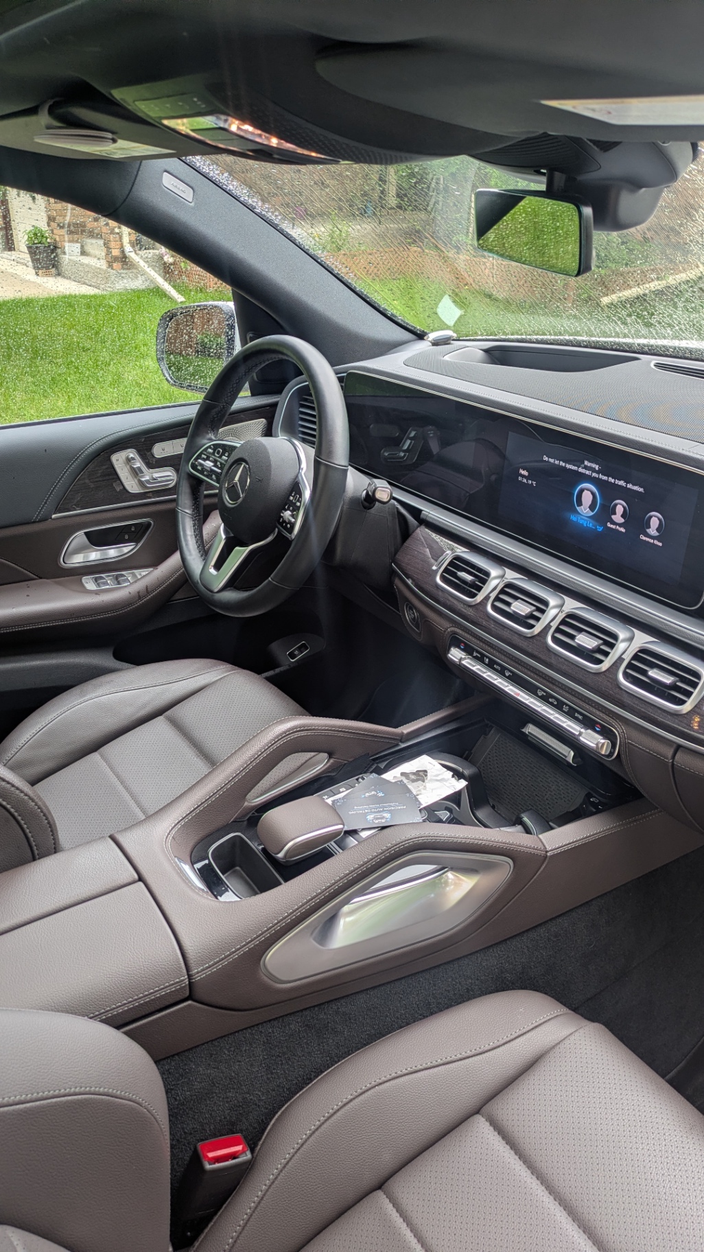 GLE cabin, brown leather and screens gleaming