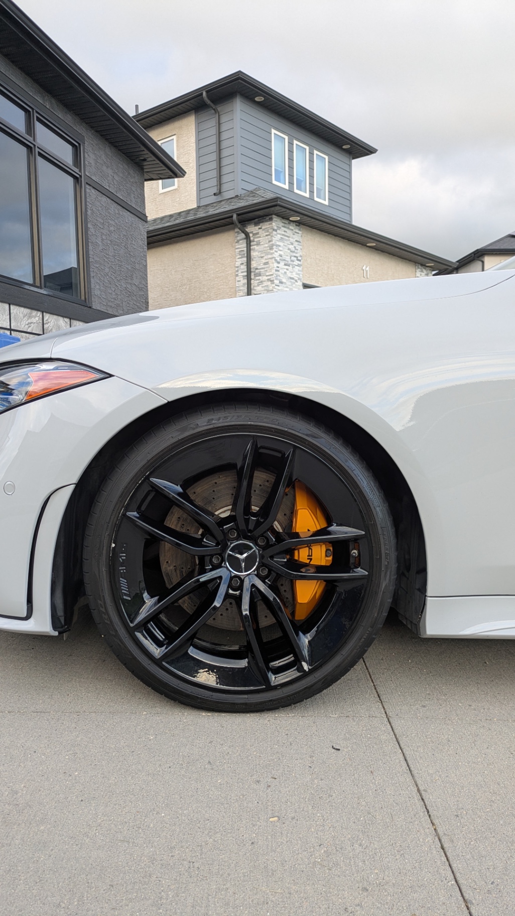 AMG wheel and orange caliper, detailed to perfection